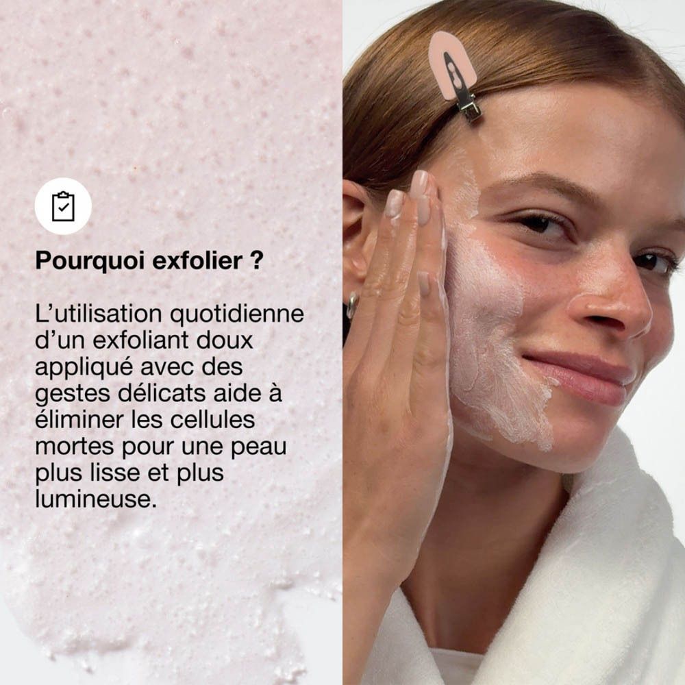 Clinique Moisture Surge Exfoliating Glow Cleanser, eine rosafarbene Tube mit Glitzer.