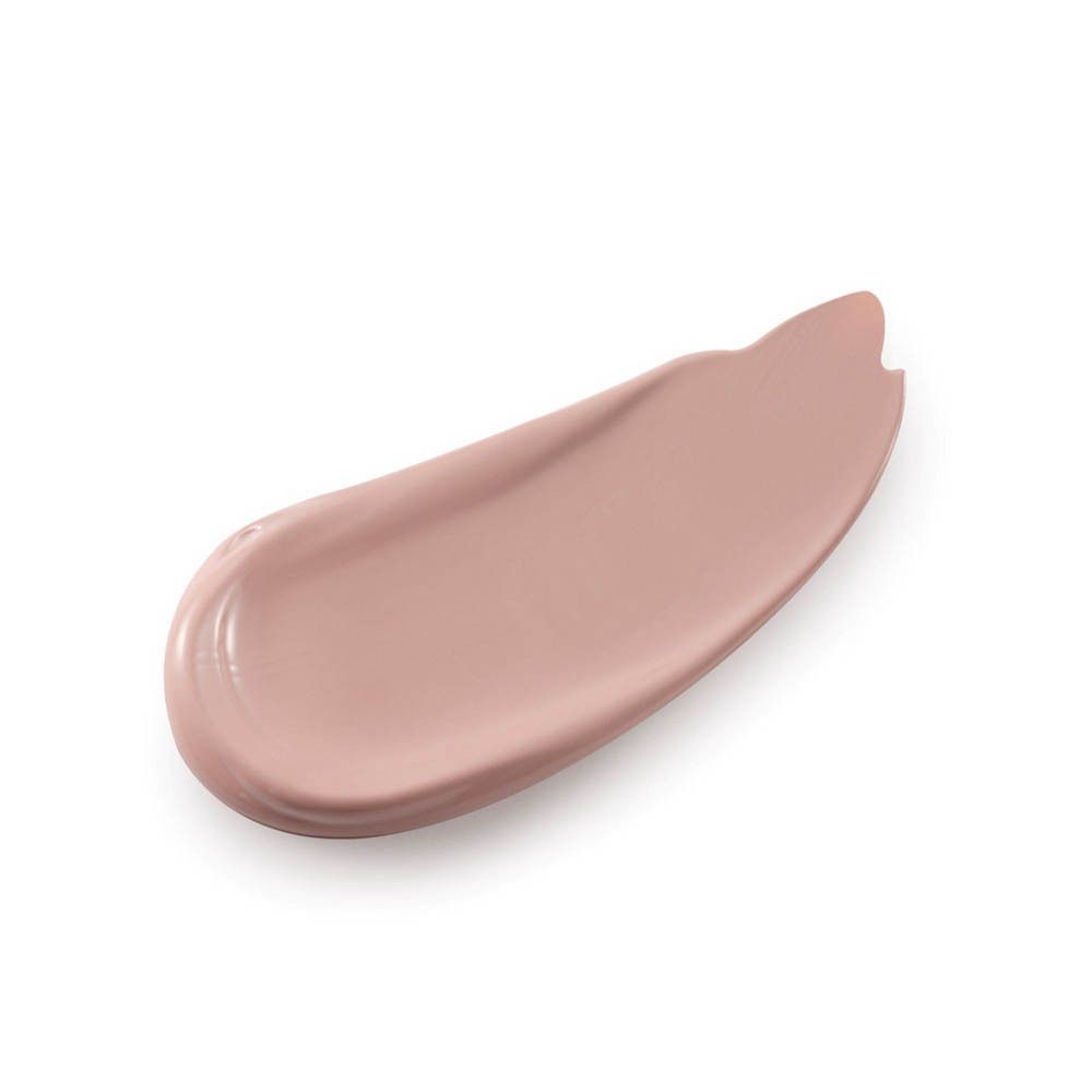 Ein Klecks hellbrauner Make-up-Grundierung auf weißem Hintergrund.