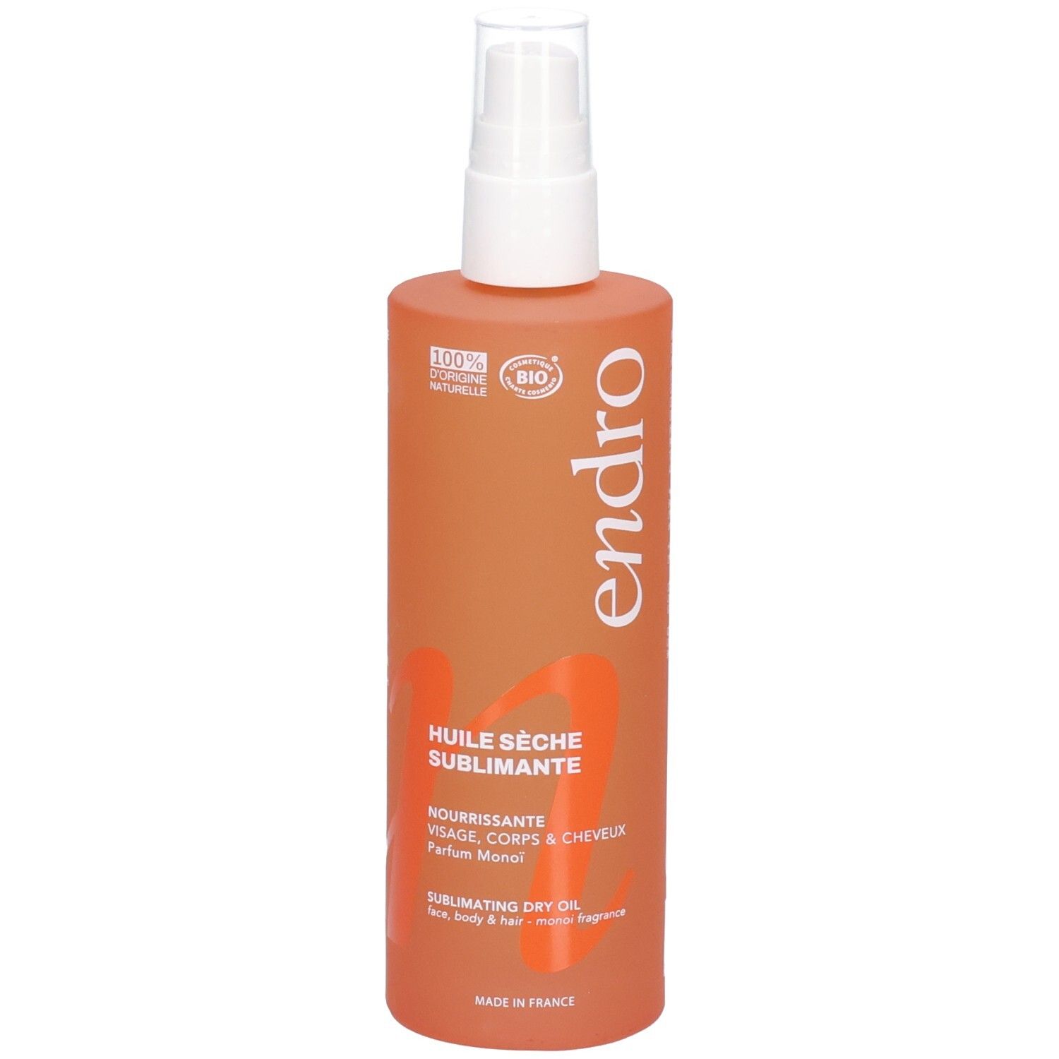 Orangefarbene Sprühflasche mit Endro Logo und Text 'Huile Sèche Sublimante'.