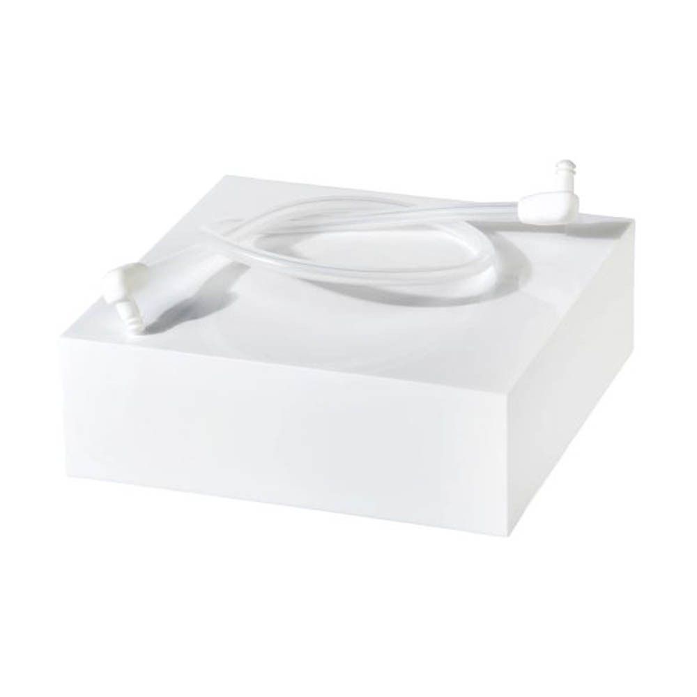 Un tube du set de double tubulure Elvie Wave posé sur une surface blanche.