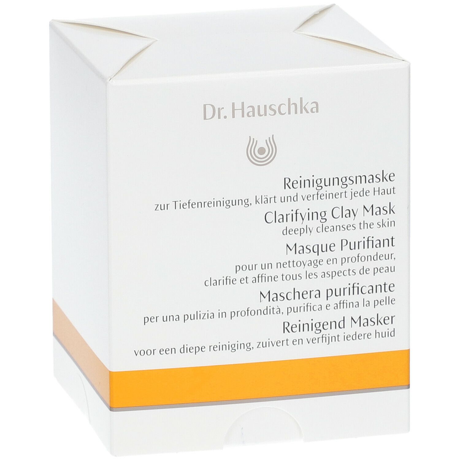 Weiße Kartonverpackung mit gelbem Streifen. Aufschrift: Dr. Hauschka, Reinigende Maske, Clarifying Clay Mask.