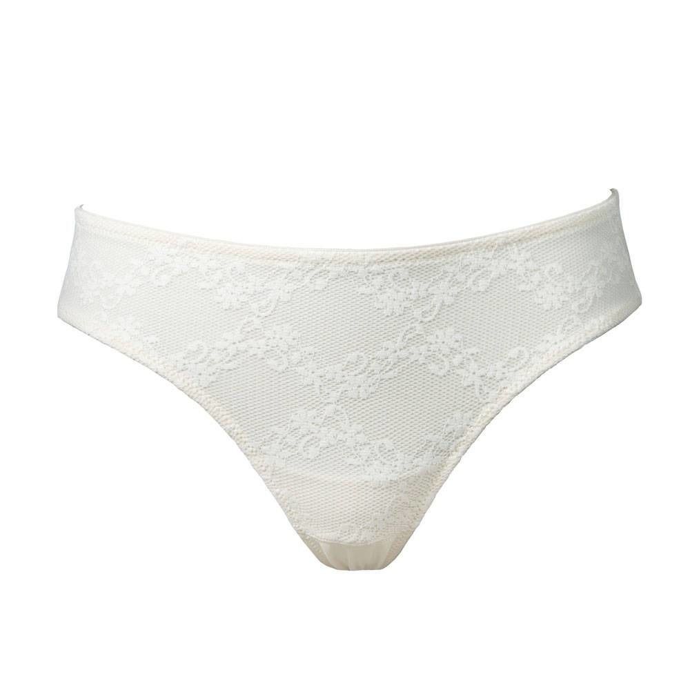 Slip ivoire en dentelle florale. Taille basse, couvrant la zone intime.