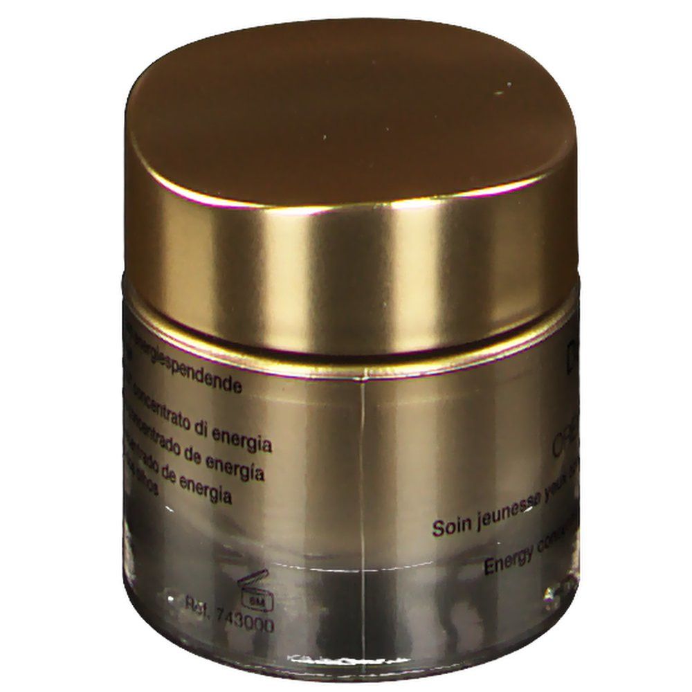 Pot doré avec couvercle. Informations produit en plusieurs langues. Inscription: Concentré d'énergie.