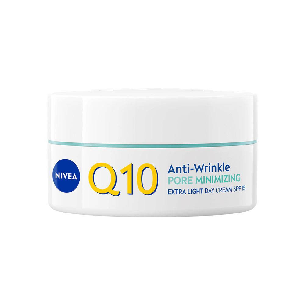 Crème de jour NIVEA Q10 Power Anti-rides pot à côté de la boîte pliante.