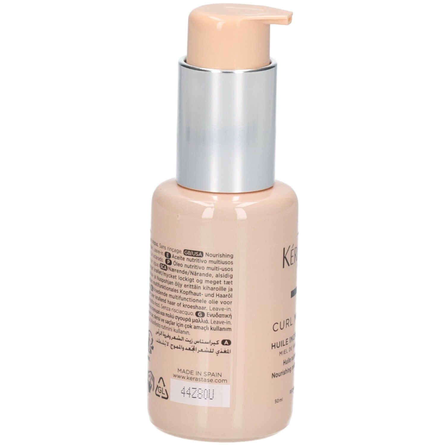 Beige Pumpflasche mit silbernem Hals und hellbeigem Pumpaufsatz. Etikett mit Produktinformationen und 'KÉRASTASE'.