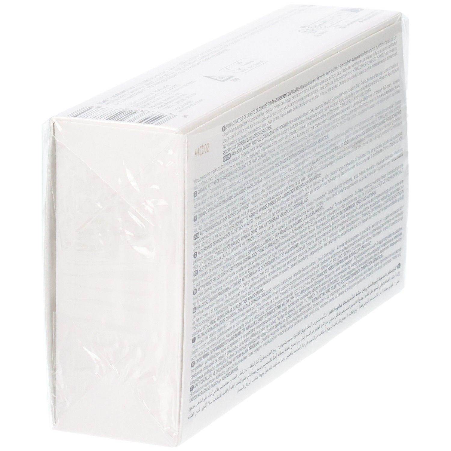 Weiße Produktverpackung, seitlich mit Text bedruckt und in Klarsichtfolie eingeschweißt.