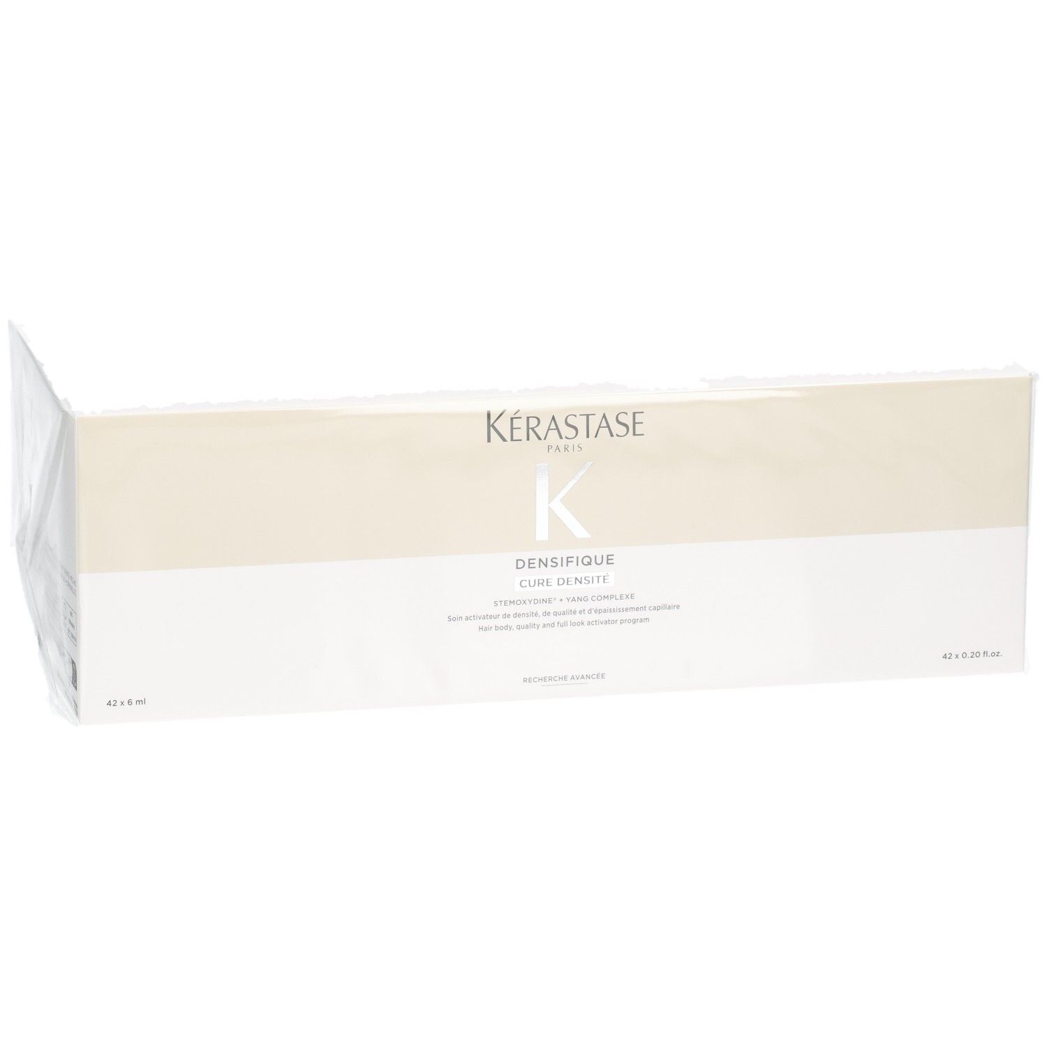 Kérastase Densifique Curl Density Haarpflege-Set in weißer Verpackung mit goldener Banderole.