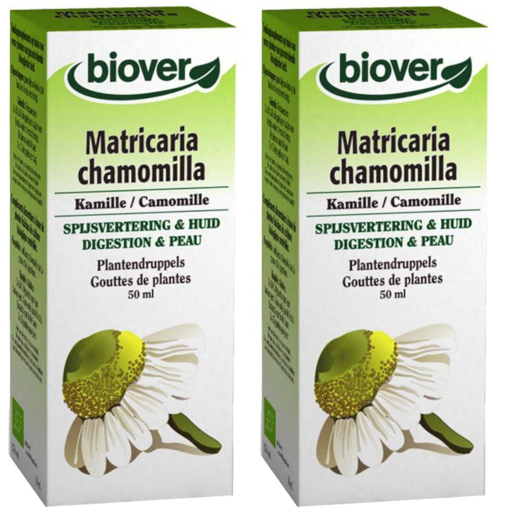 Zwei Kartons mit "biover"-Logo und "Matricaria chamomilla". Text in Deutsch, Französisch und Niederländisch. Kamillenblüten-Illustration.