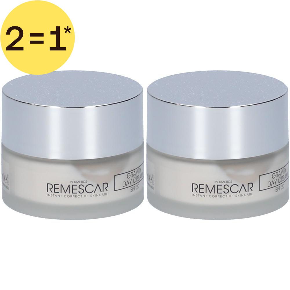 Deux pots de crème de jour Remescar Gravity avec couvercles argentés et indication SPF 20.
