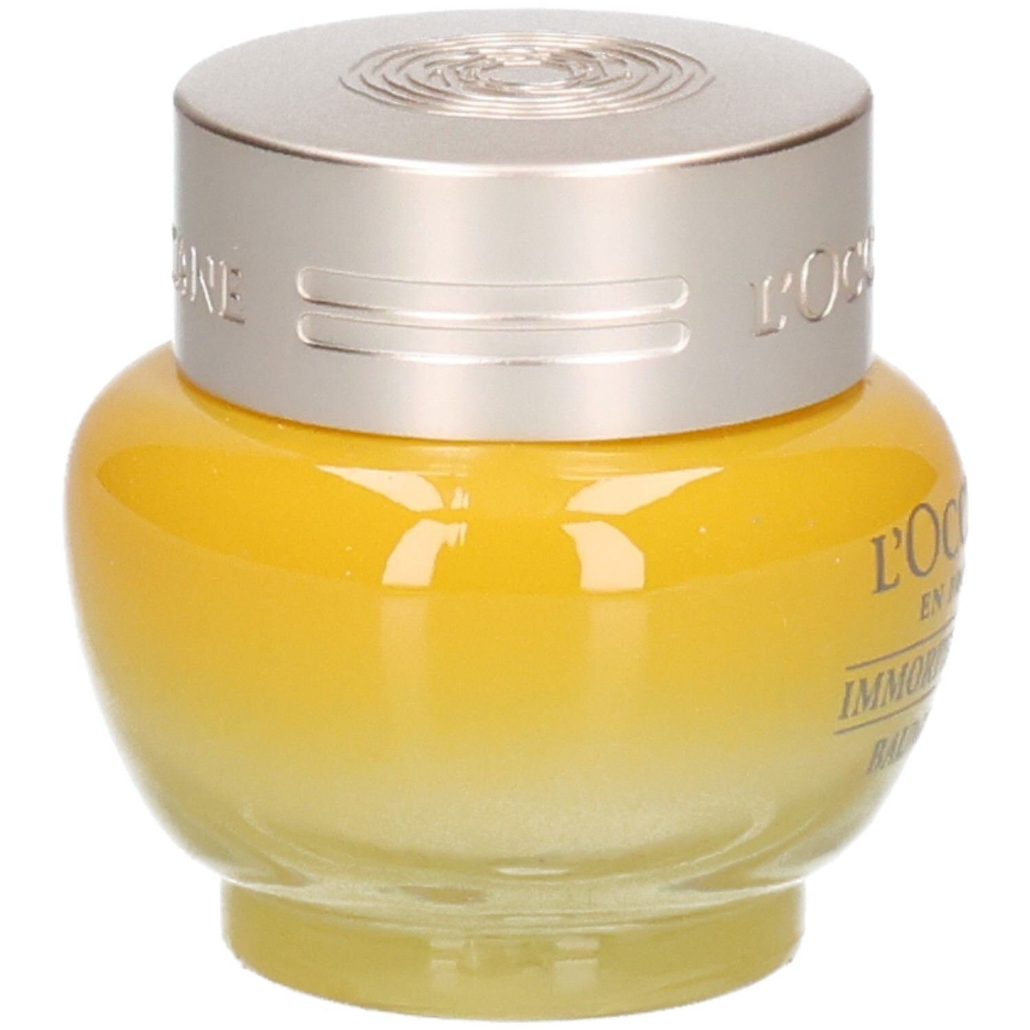 L'OCCITANE Baume Regard Immortelle Divine, vue latérale d'un pot jaune avec un couvercle argenté.