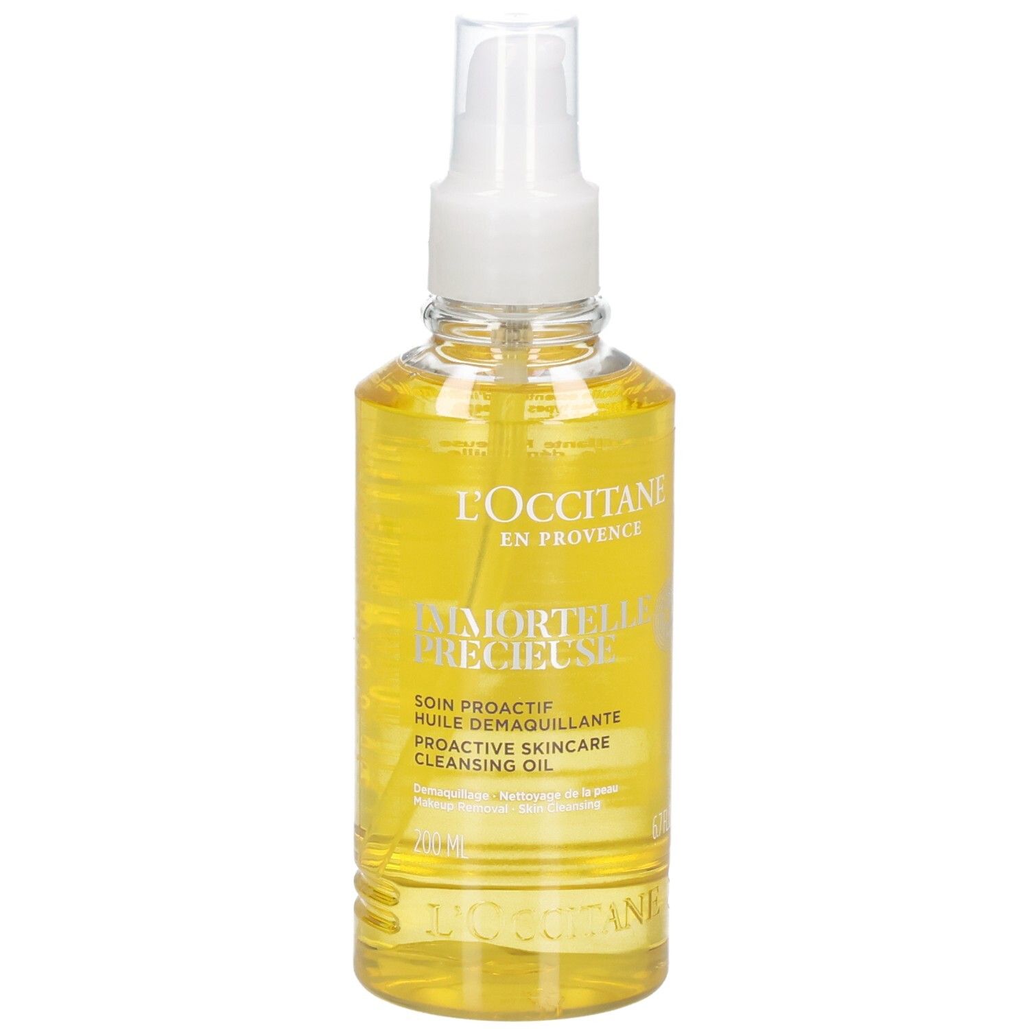L'OCCITANE Immortelle Reinigungsöl in klarer Sprühflasche mit gelbem Öl.