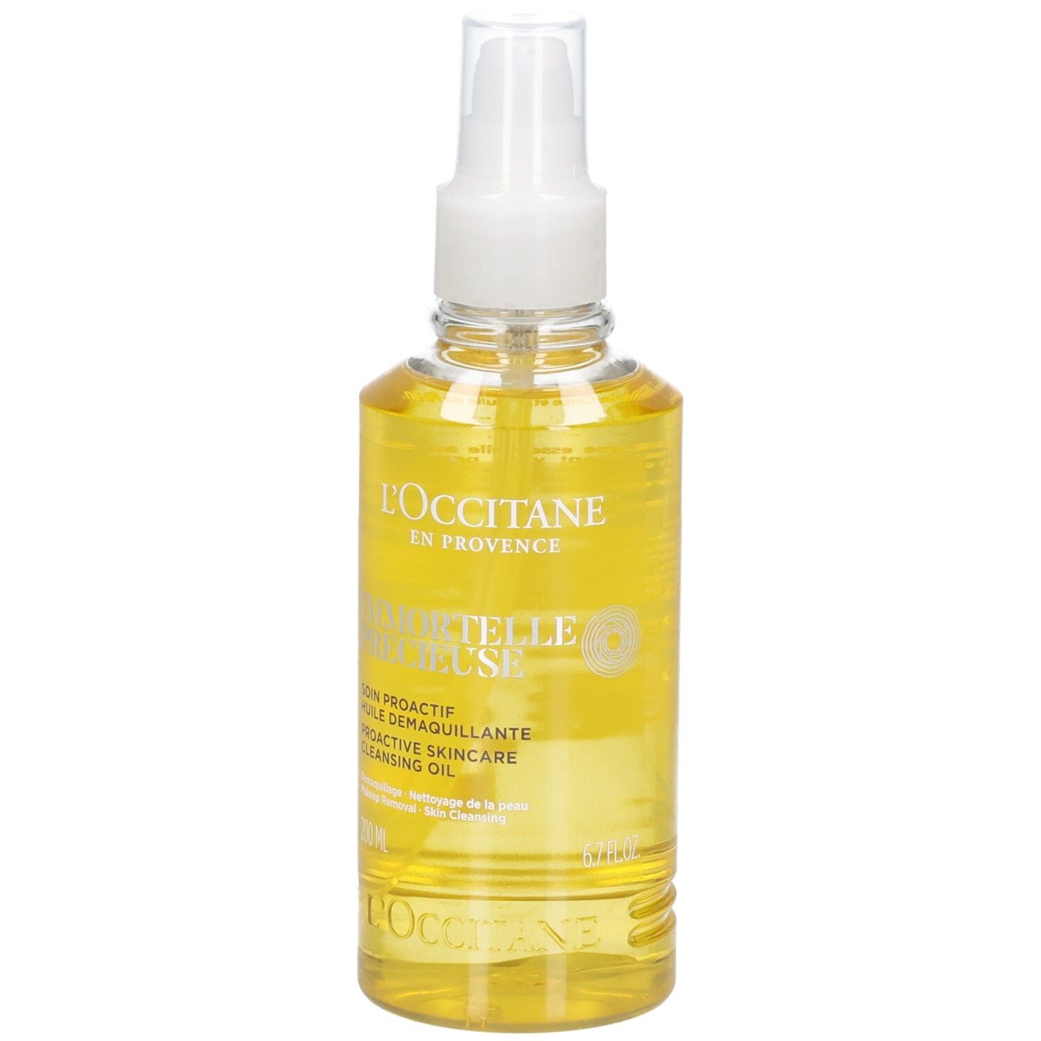 L'OCCITANE Immortelle Reinigungsöl in klarer Sprühflasche mit gelbem Öl.