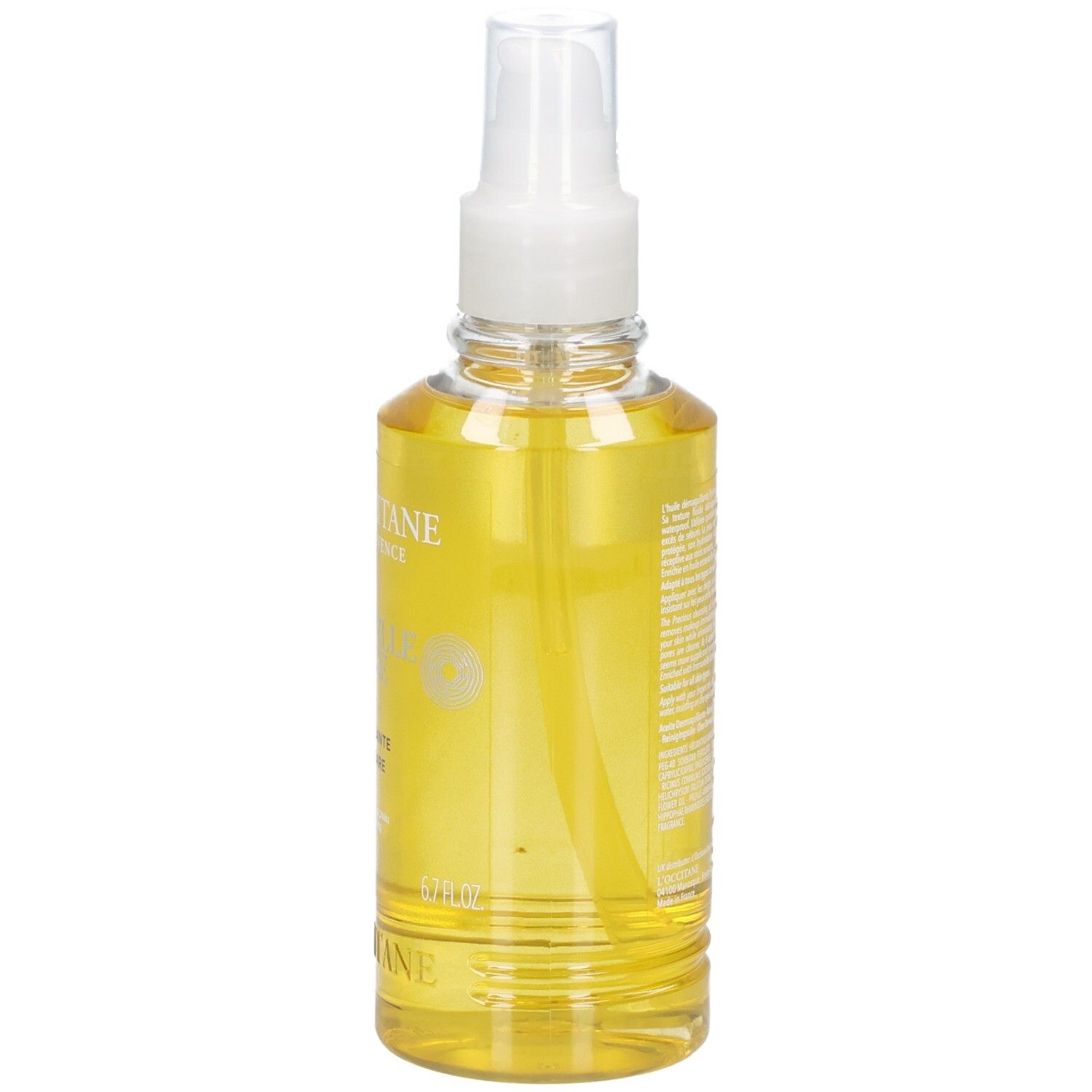 L'OCCITANE Immortelle Reinigungsöl in klarer Sprühflasche mit gelbem Öl.