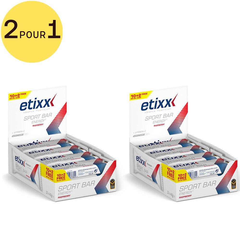 Deux présentoirs de barres énergétiques Etixx. Inscription "2 pour 1". Sur chaque présentoir: "Etixx Sport Bar Energy".