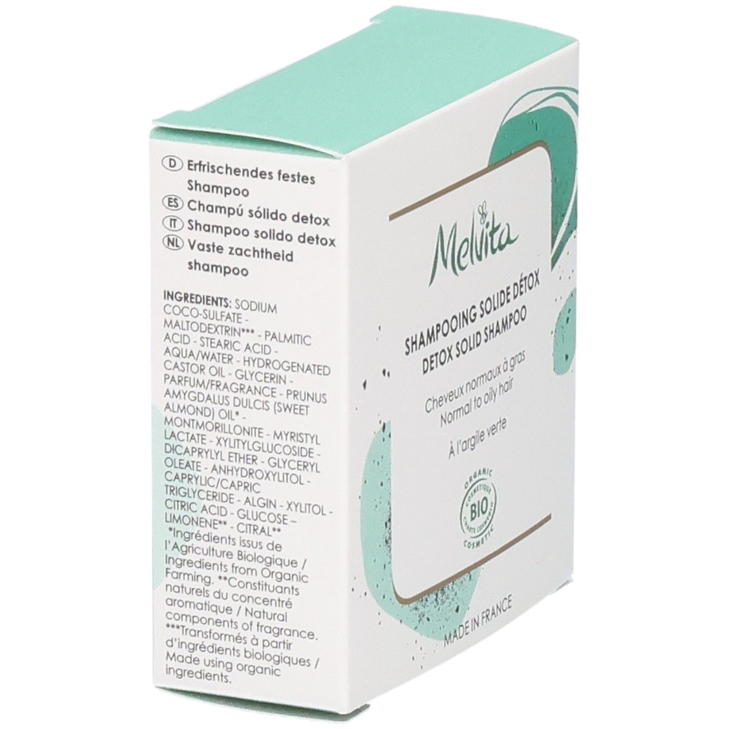 Boîte de shampoing solide détox Melvita, vue latérale avec ingrédients et label BIO.