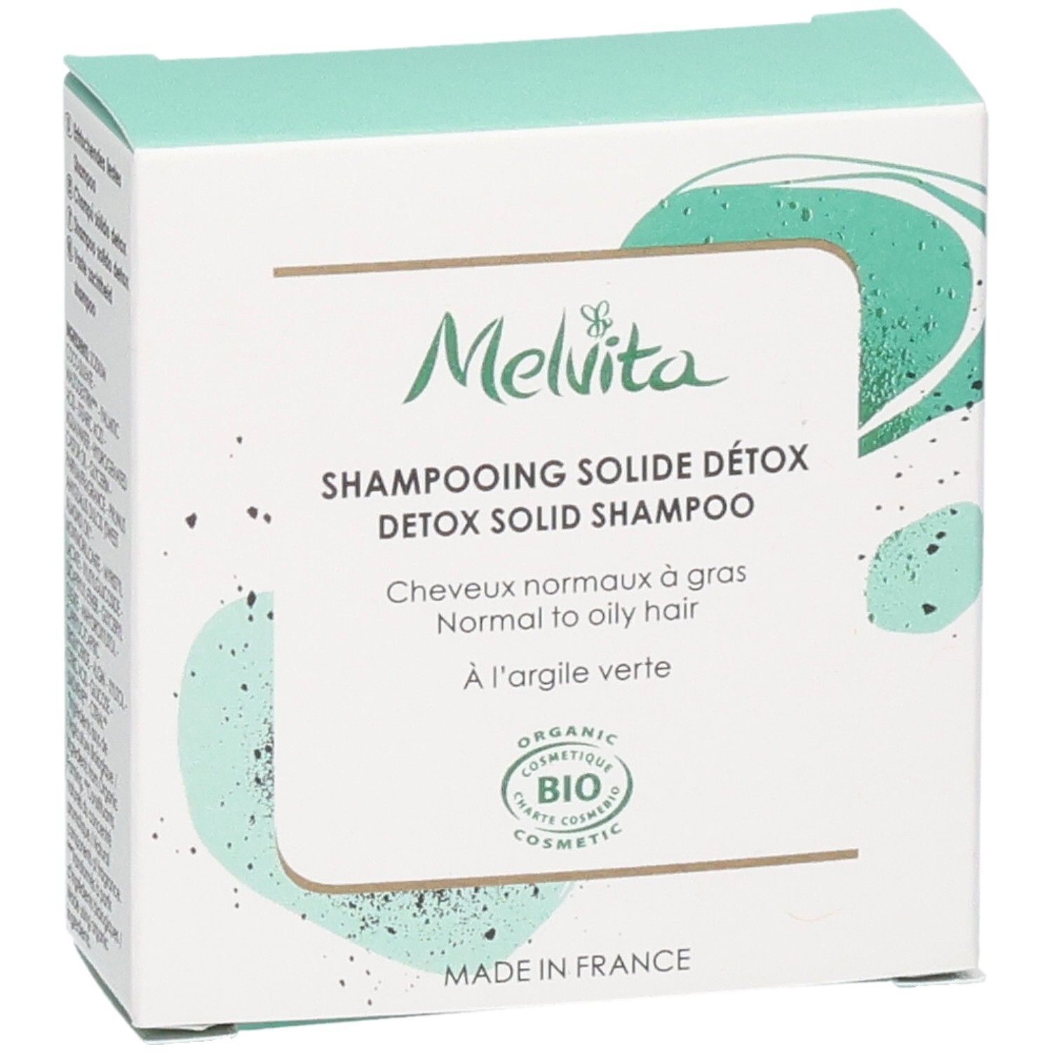 Boîte de shampoing solide détox Melvita avec label BIO et mention "Made in France".