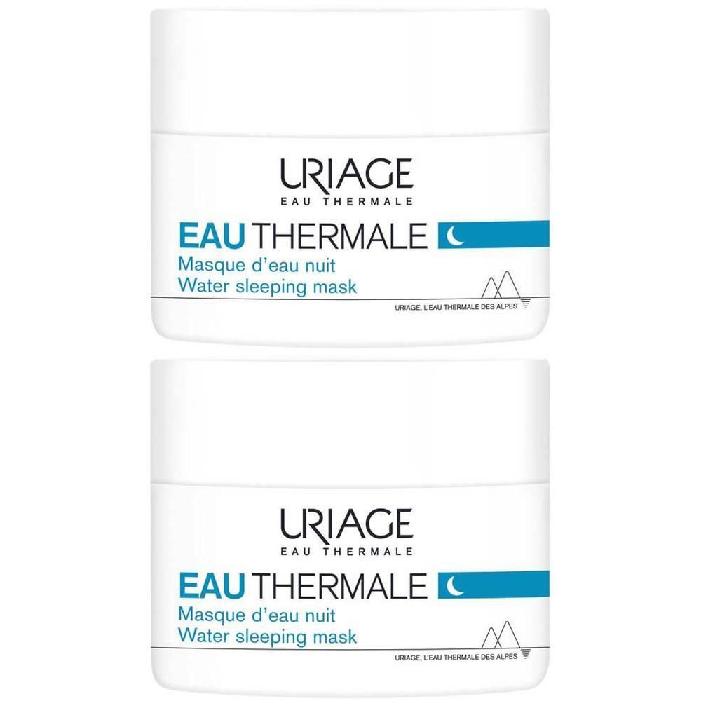 Zwei weiße Tiegel mit Uriage Eau Thermale Water Sleeping Mask und blauem Deckel.