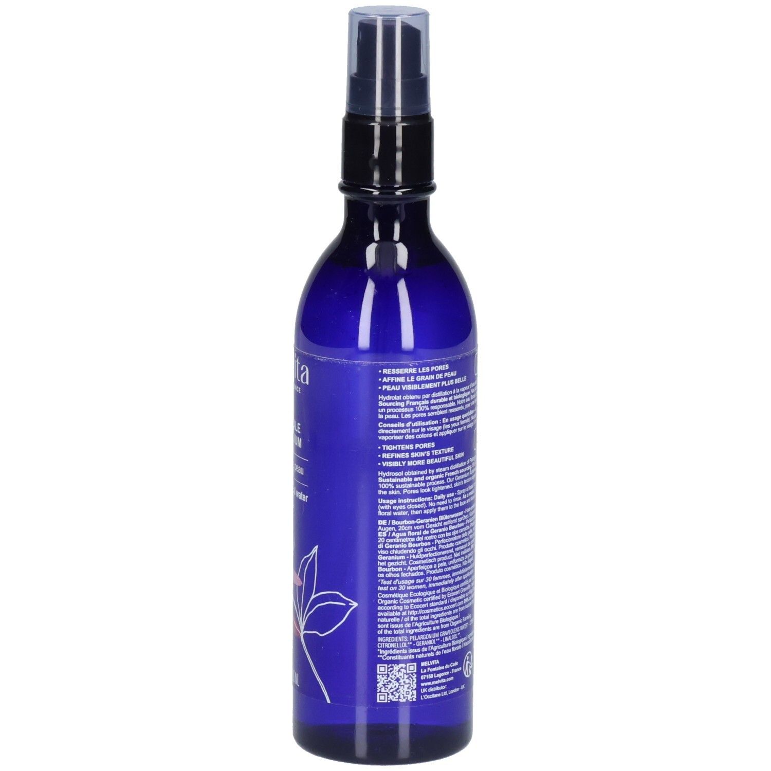 Flacon bleu avec vaporisateur. Texte sur le côté. Certification bio. Étiquette avec ingrédients et instructions.