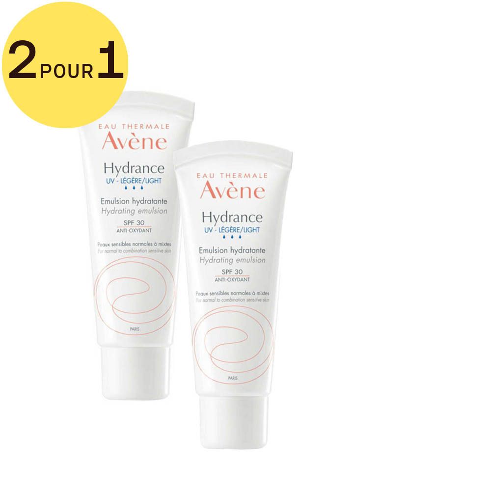 Deux tubes Avène Hydrance Emulsion, avec autocollant jaune 2 pour 1. Tubes blancs avec texte rouge et noir.