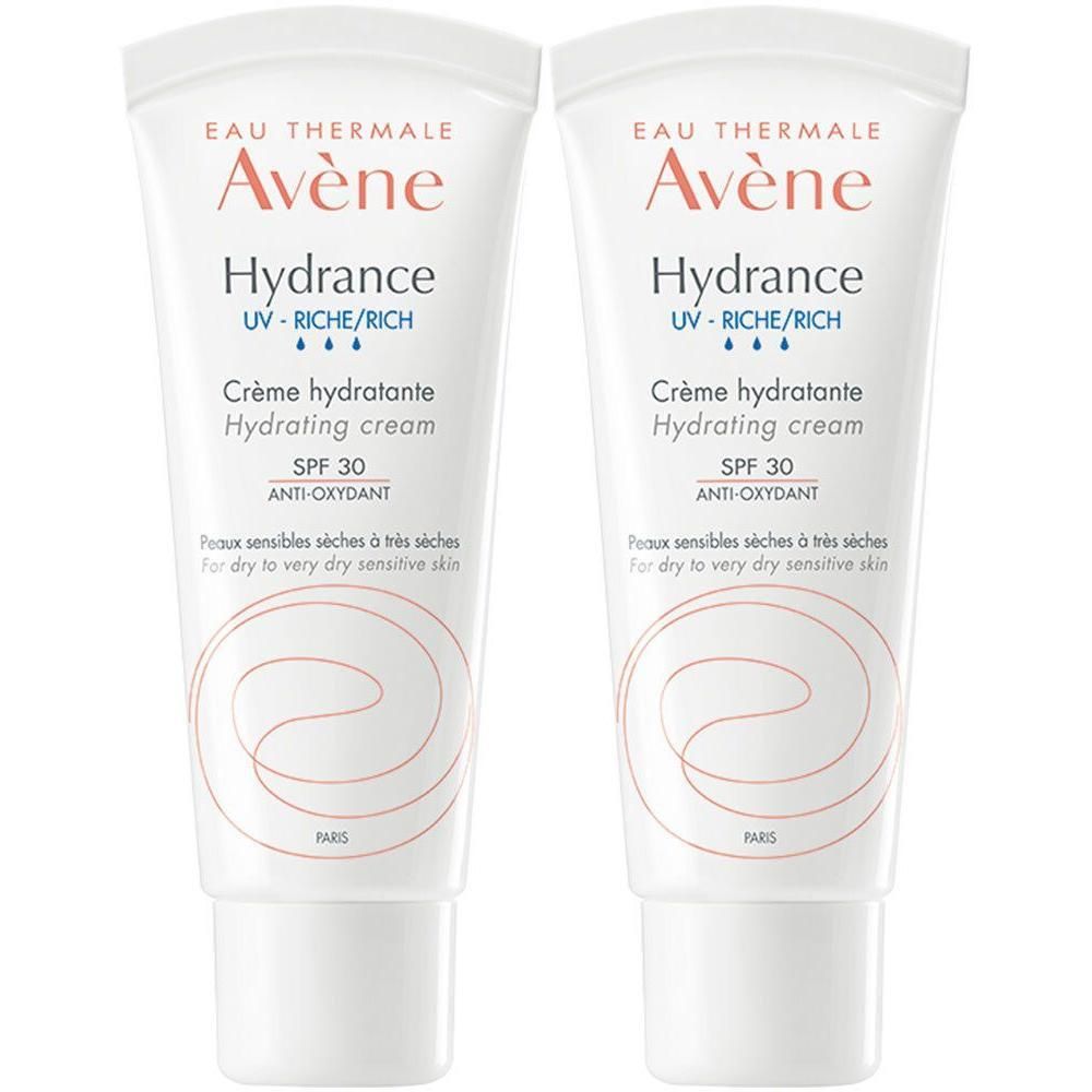Zwei Tuben Creme, weiß mit blauer und roter Schrift. Text: Avène Hydrance, Crème hydratante, SPF 30, für trockene, empfindliche Haut.