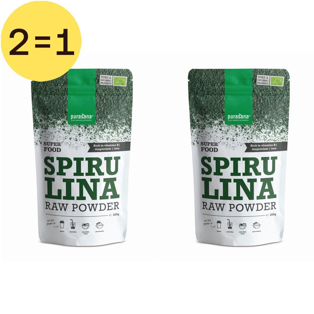 Deux sachets de poudre de spiruline Purasana. Inscription : Superfood, Spiruline, Raw Powder. Certification bio. Cercle jaune avec "2=1".