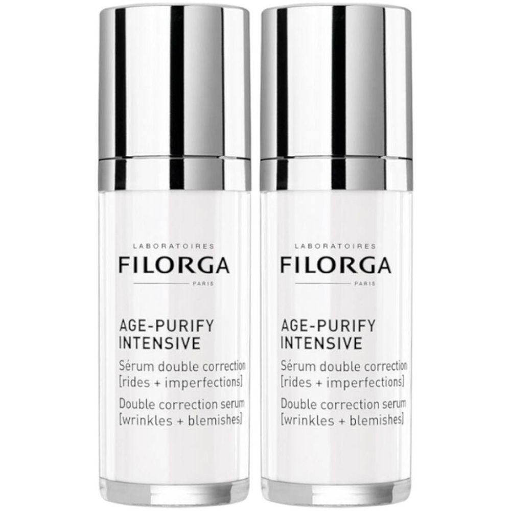 Zwei Flaschen Filorga Age-Purify Intensive Serum. Weiße Flaschen mit silbernen Deckeln. Text: Age-Purify Intensive, Sérum double correction.