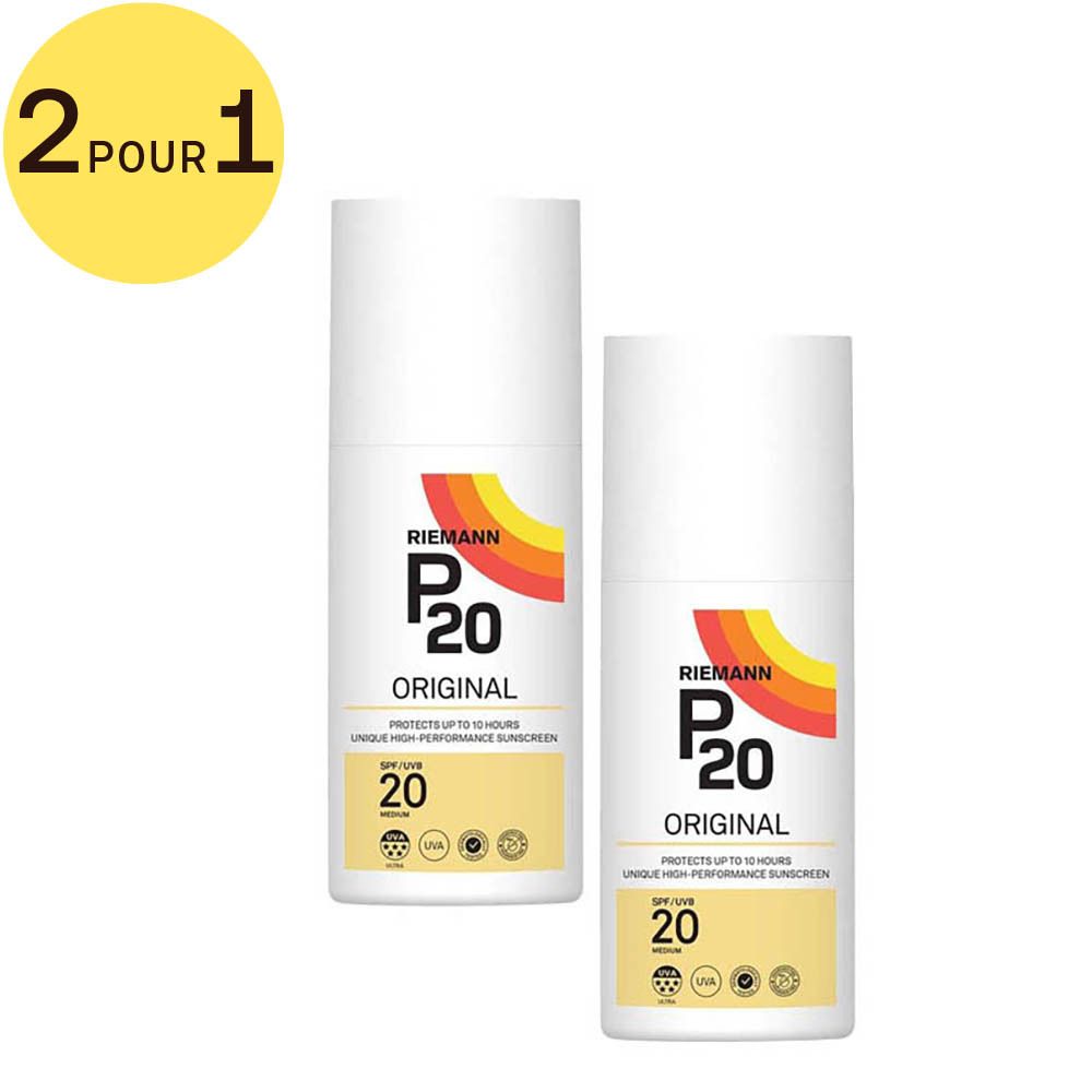 Deux flacons spray blancs avec étiquette jaune. Inscription: P20 Original, SPF 20. Marque: Riemann. Cercle jaune: 2 pour 1.