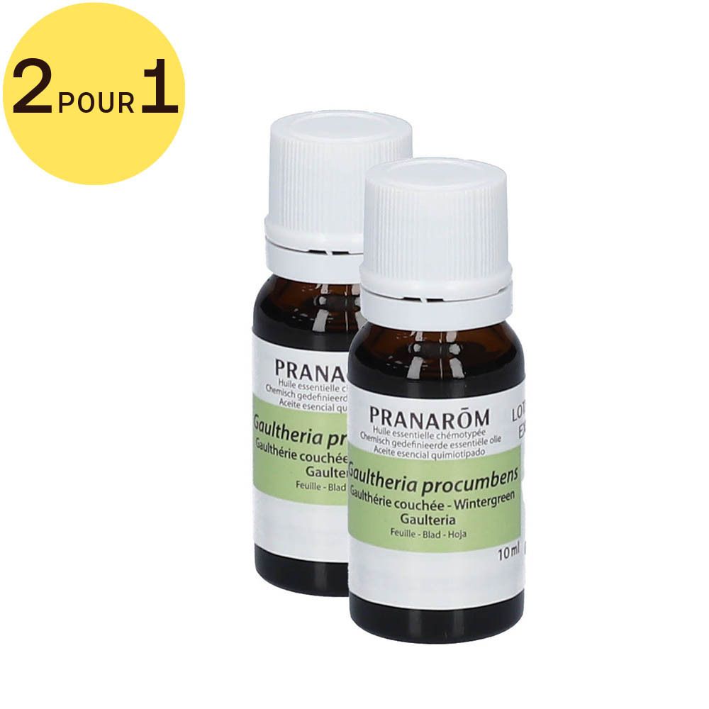 Deux flacons à bouchon blanc. Inscription: Pranarôm, Gaulthérie procumbens. Cercle jaune avec inscription: 2 pour 1.