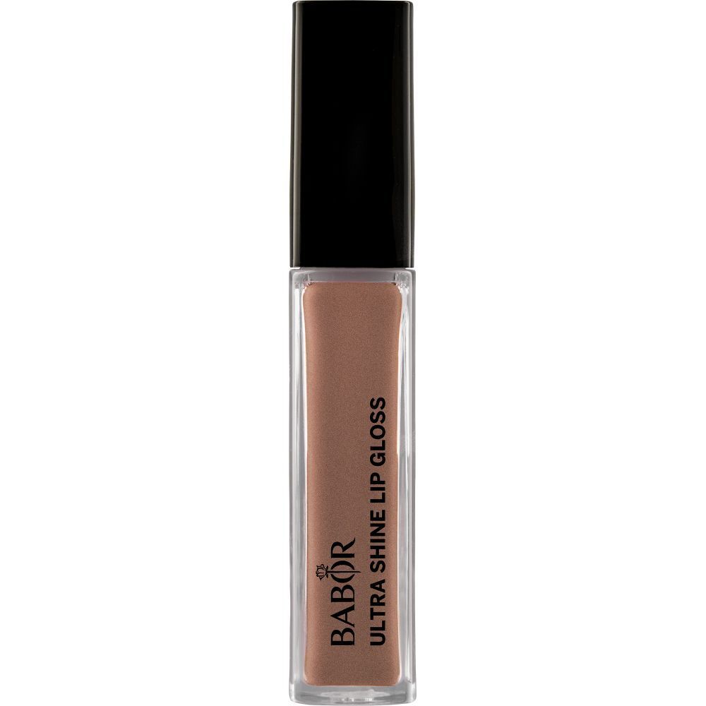 Gloss à lèvres Babor Ultra Shine. Tube transparent, bouchon noir. Contenu bronze. Inscription: Ultra Shine Lip Gloss.