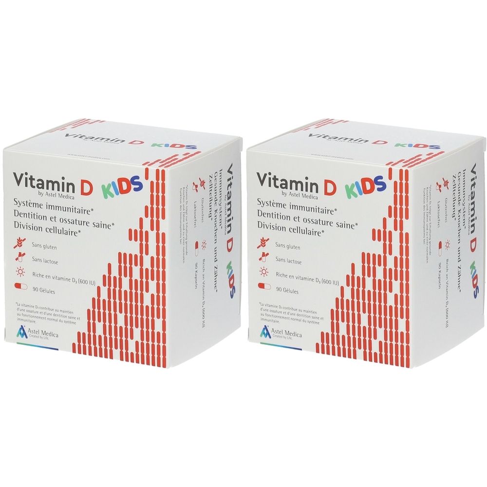 Zwei weiße Kartons mit rotem Muster und Text: Vitamin D KIDS. Enthält 90 Kapseln. System immunitaire, Dentition et ossature saine, Division cellulaire.