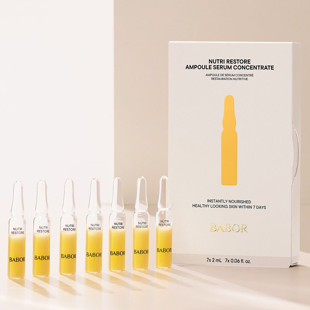 Babor Nutri Restore Ampullen-Konzentrat: Einzelne Glasampulle mit gelbem Serum.