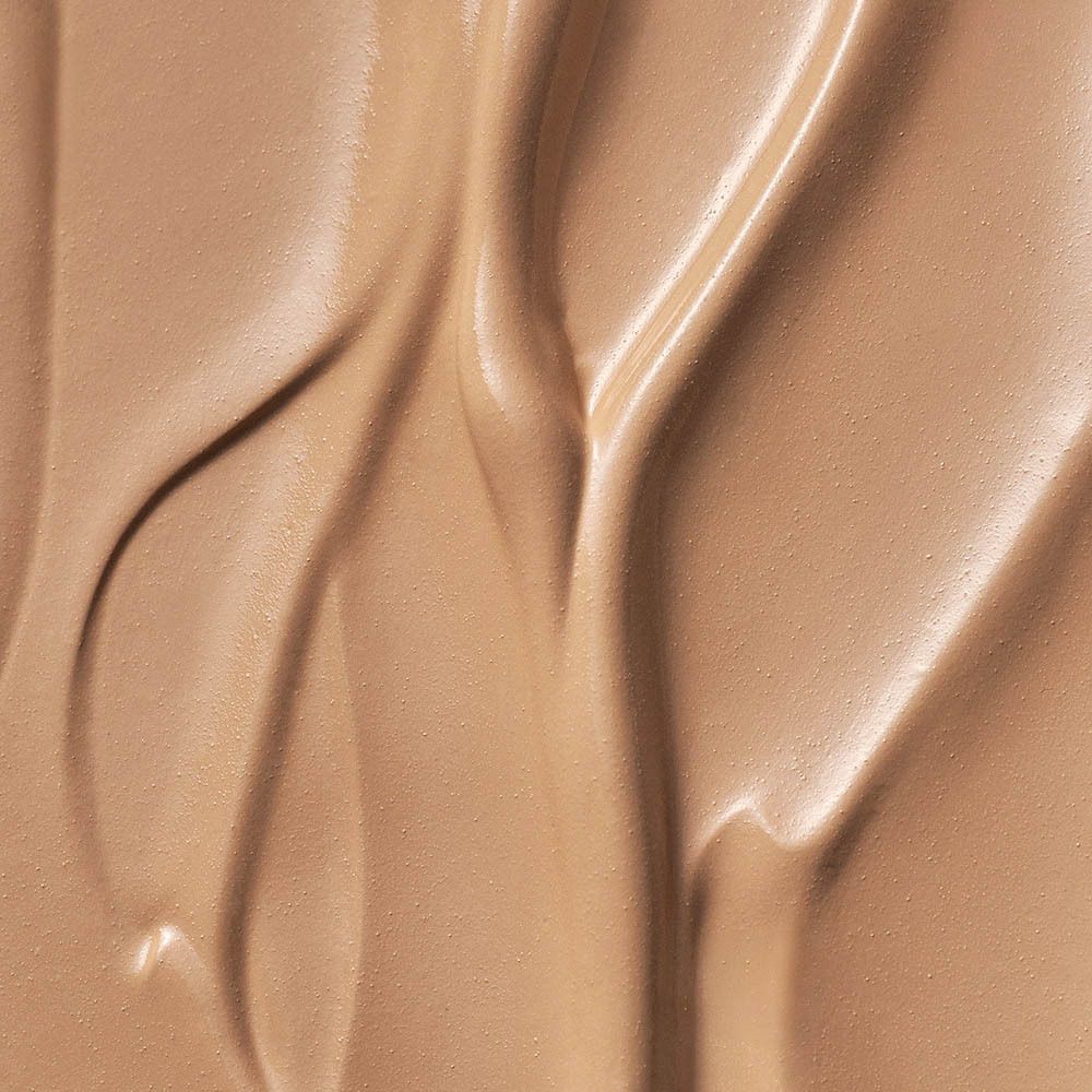 Nahaufnahme von BB Cream. Creme in hellbrauner Farbe, glatte Textur.