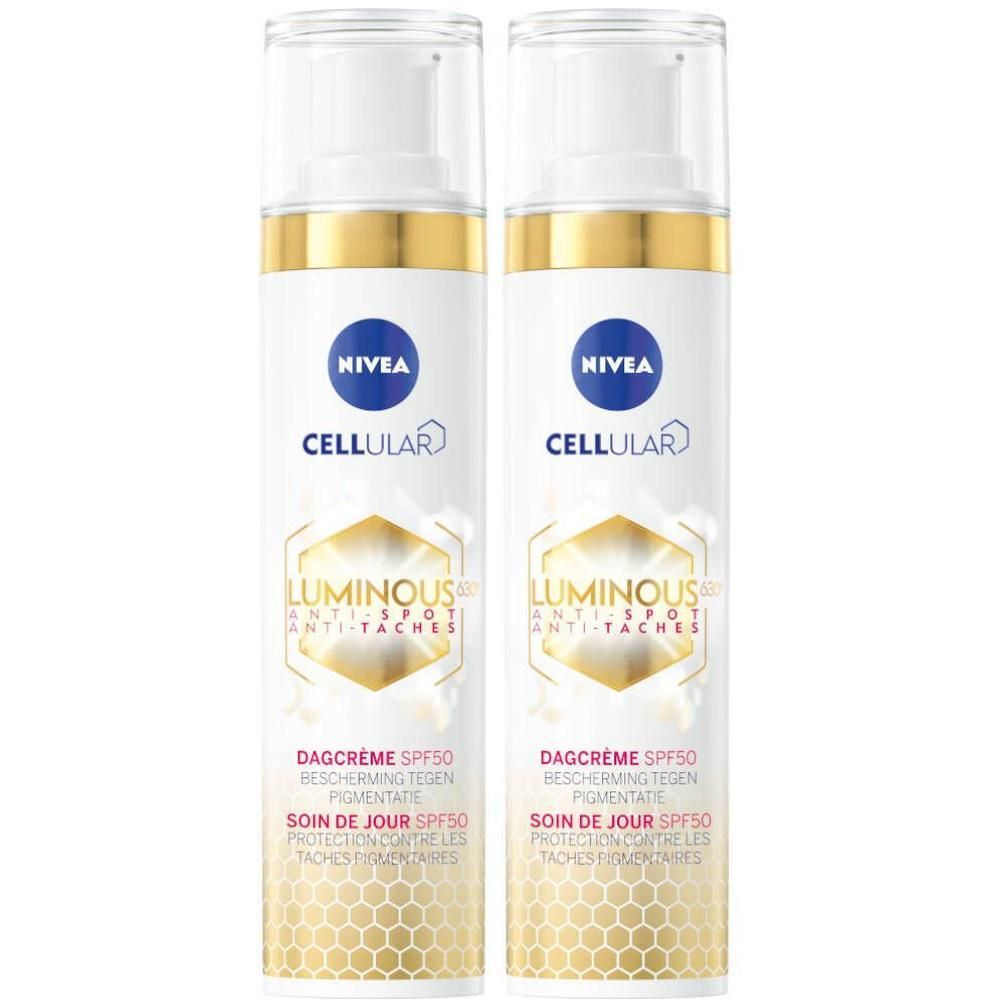 Zwei Flaschen Tagespflege mit weißem Pumpkopf und goldfarbenem Ring. Aufschrift: CELLULAR LUMINOUS 630® ANTI-PIGMENTFLECKEN. SPF 50.