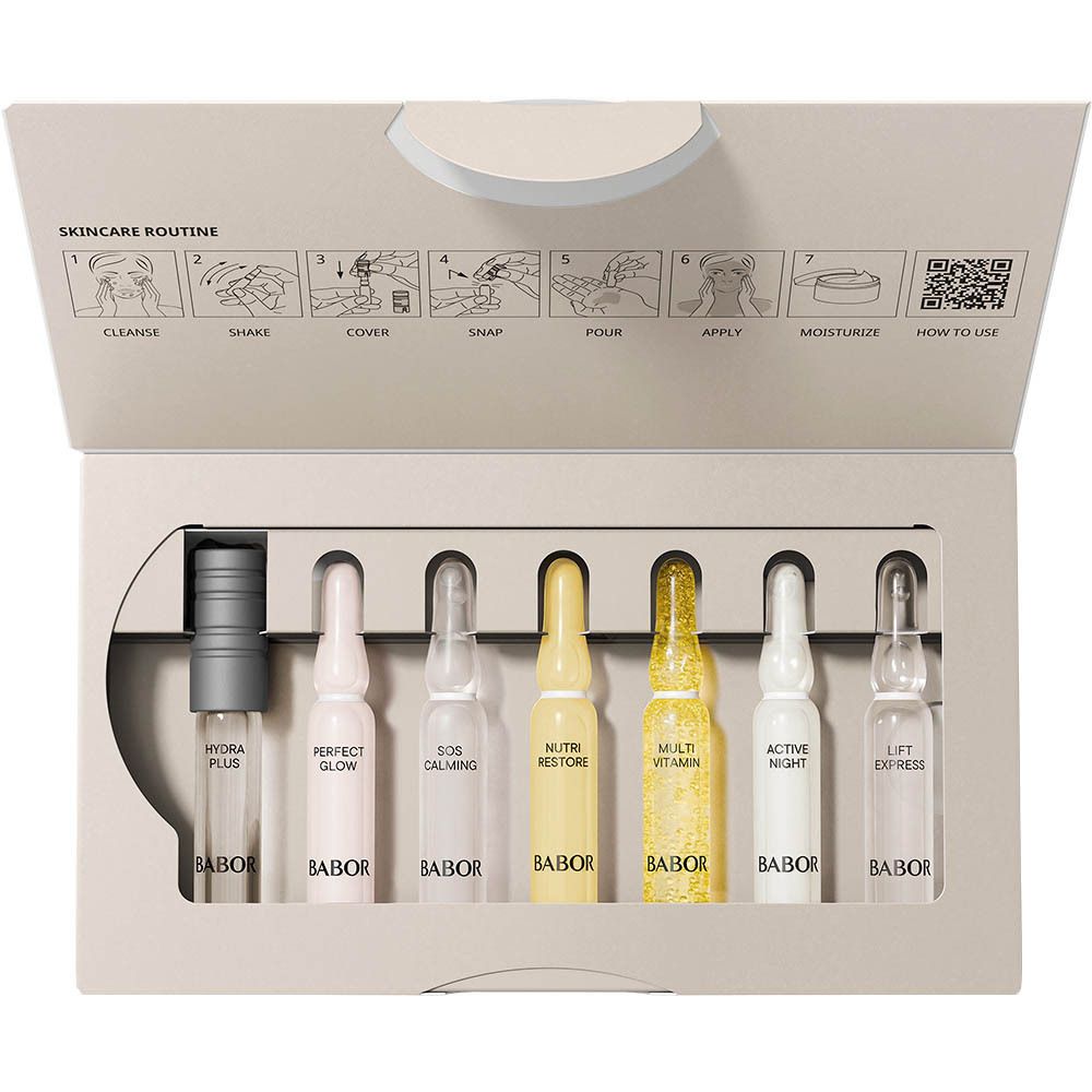 Emballage ouvert avec ampoules. Contient 7 ampoules de sérums différents.