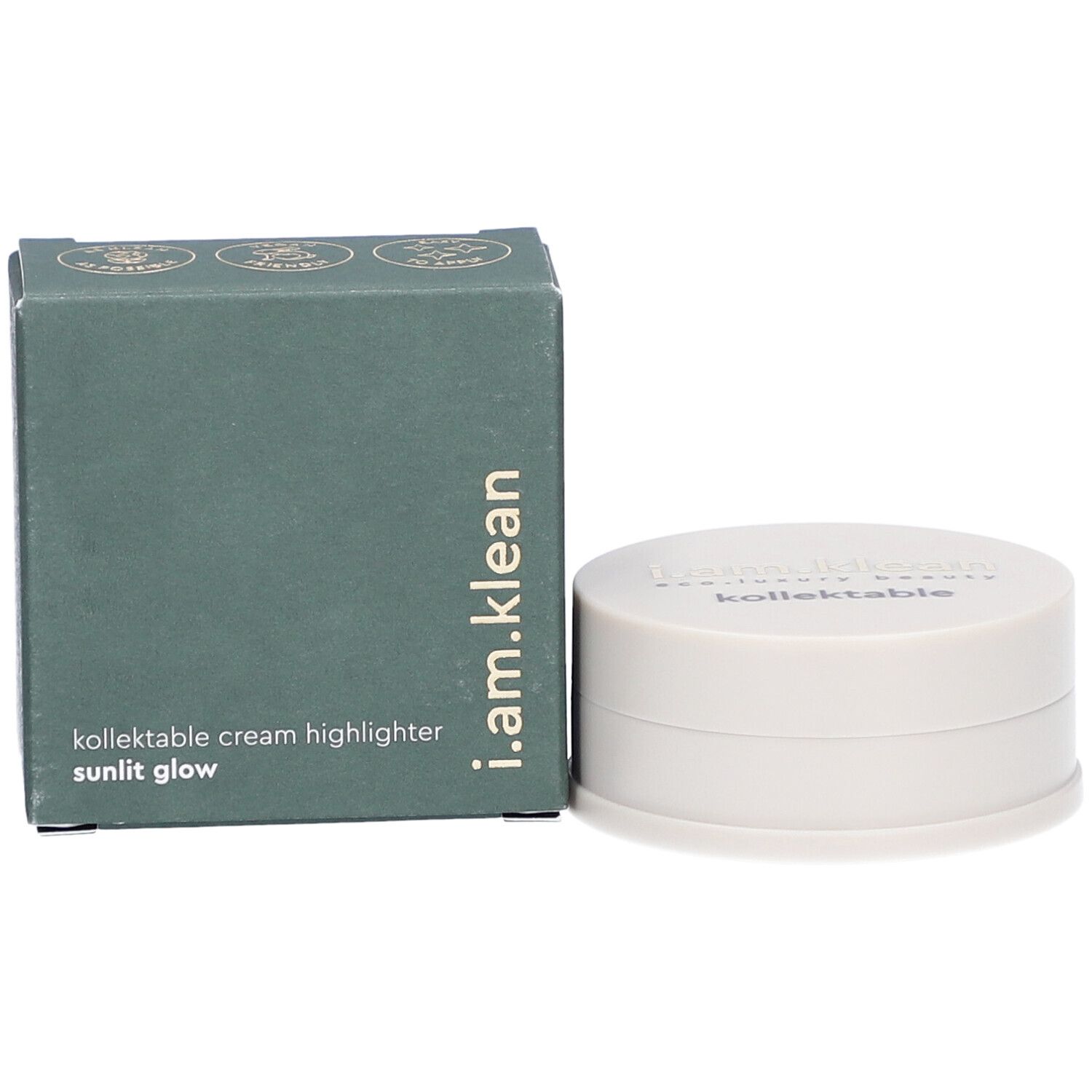 Grüne Schachtel und cremefarbener Behälter. Auf der Schachtel steht i.am.klean, kollektable cream highlighter sunlit glow. Der Behälter hat einen Deckel mit Schriftzug.