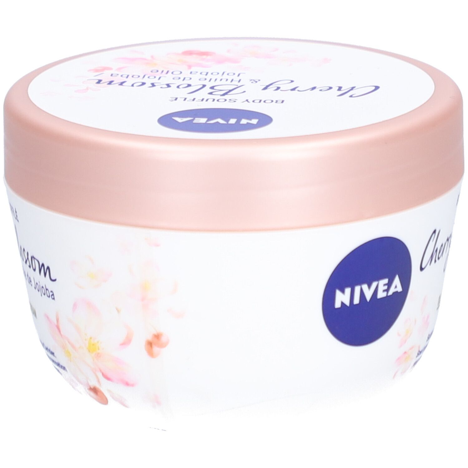 Pot blanc avec couvercle rose. Inscription : NIVEA, Body Soufflé Cherry Blossom & Jojoba Olie. Motif floral.