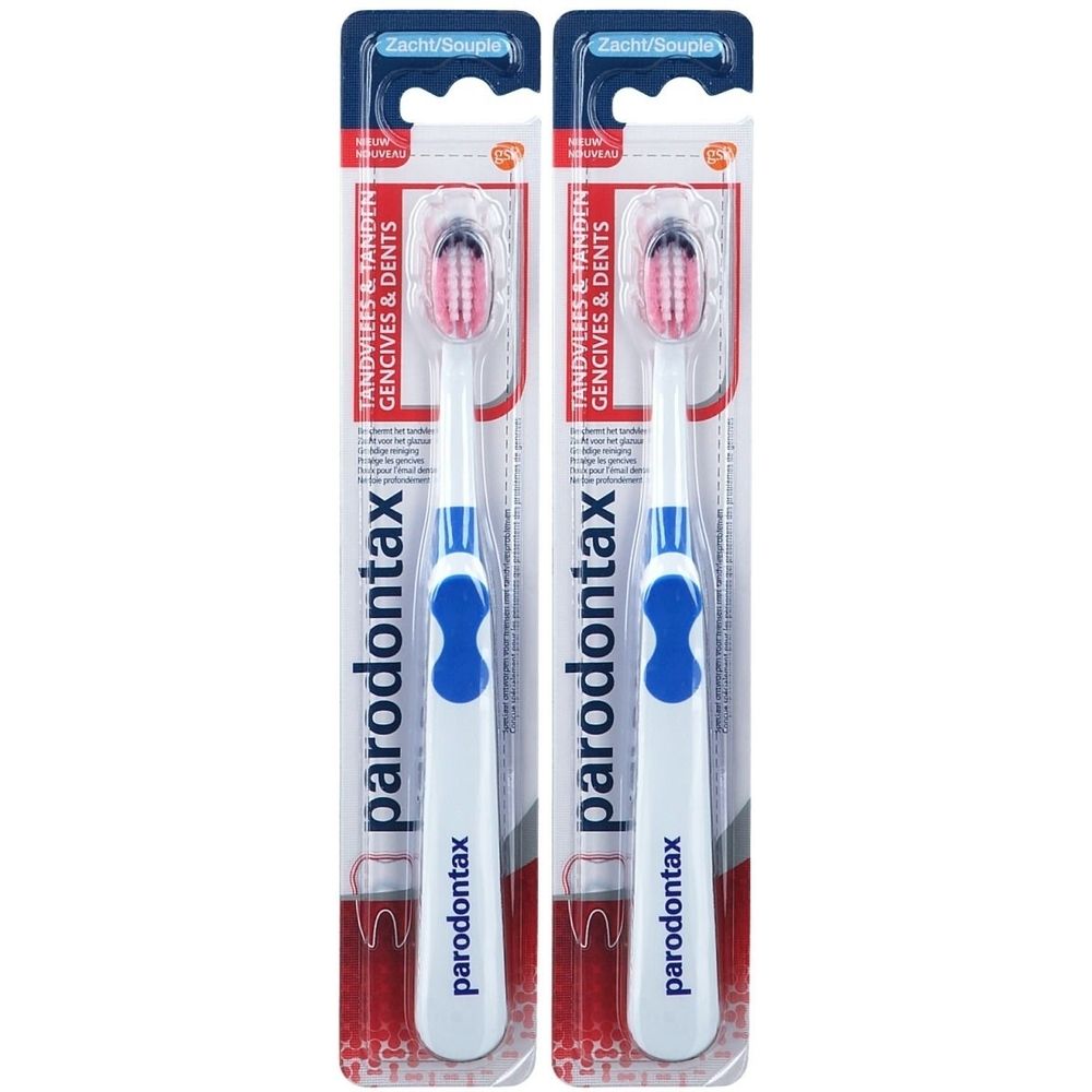 Zwei Zahnbürsten in Verpackung. Weißer Griff mit blauem Einsatz, roter Bürstenkopf. Aufschrift: parodontax.