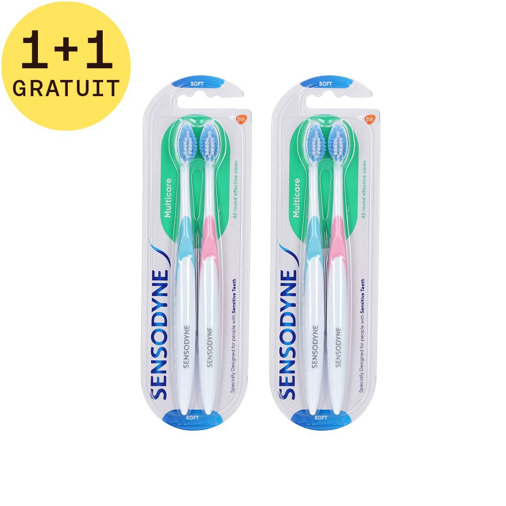Deux brosses à dents en blister. Manches bleues et roses, soies bleues. Inscription: Sensodyne, Multicare, Soft. 1+1 GRATUIT.
