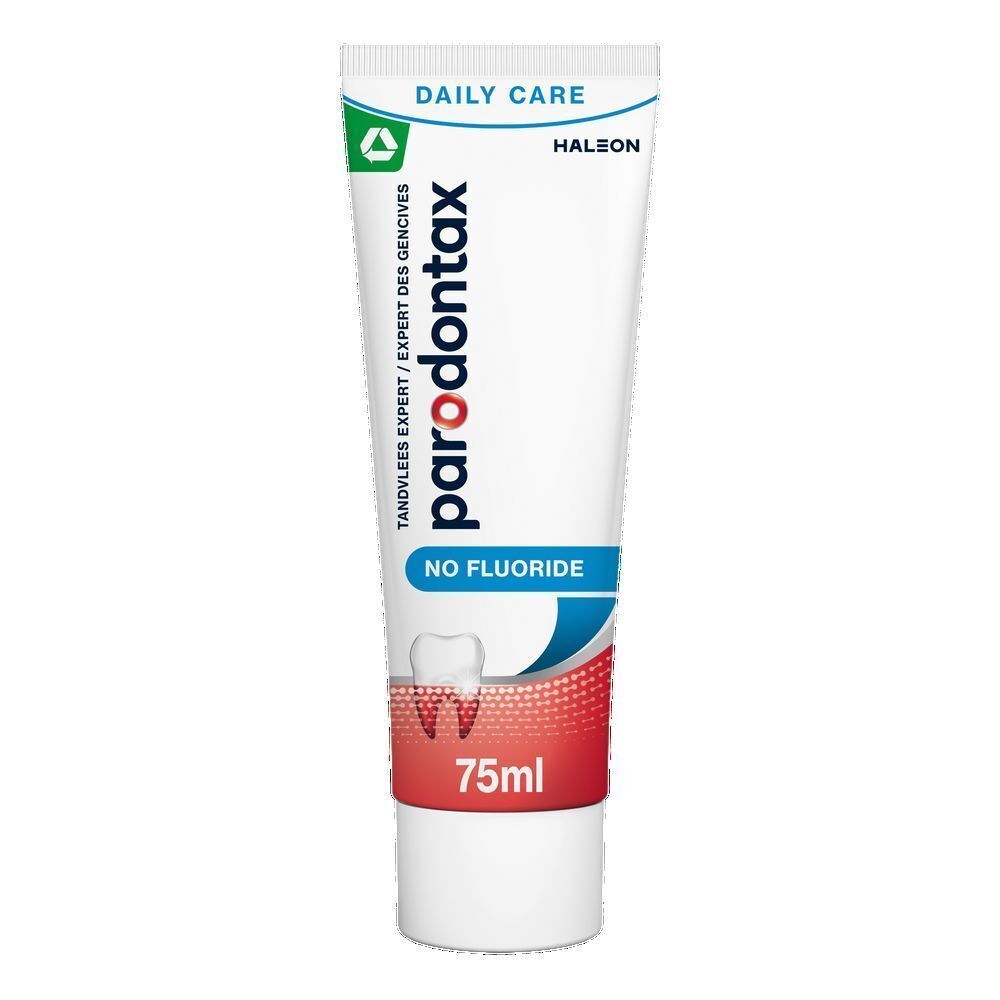 Dentifrice PARODONTAX sans fluor en boîte. Texte rouge et blanc.