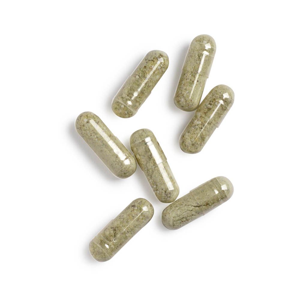 Un flacon de Biotics Research GTA-Forte et trois capsules.