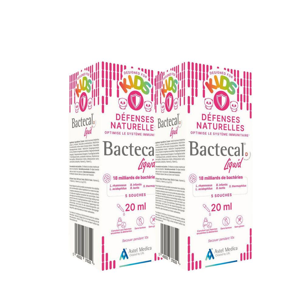 Deux boîtes de Bactecal® D Liquid Kids. Emballage blanc avec accents roses. Texte: „Défenses Naturelles“, „18 milliards de bactéries“, „20 ml“.