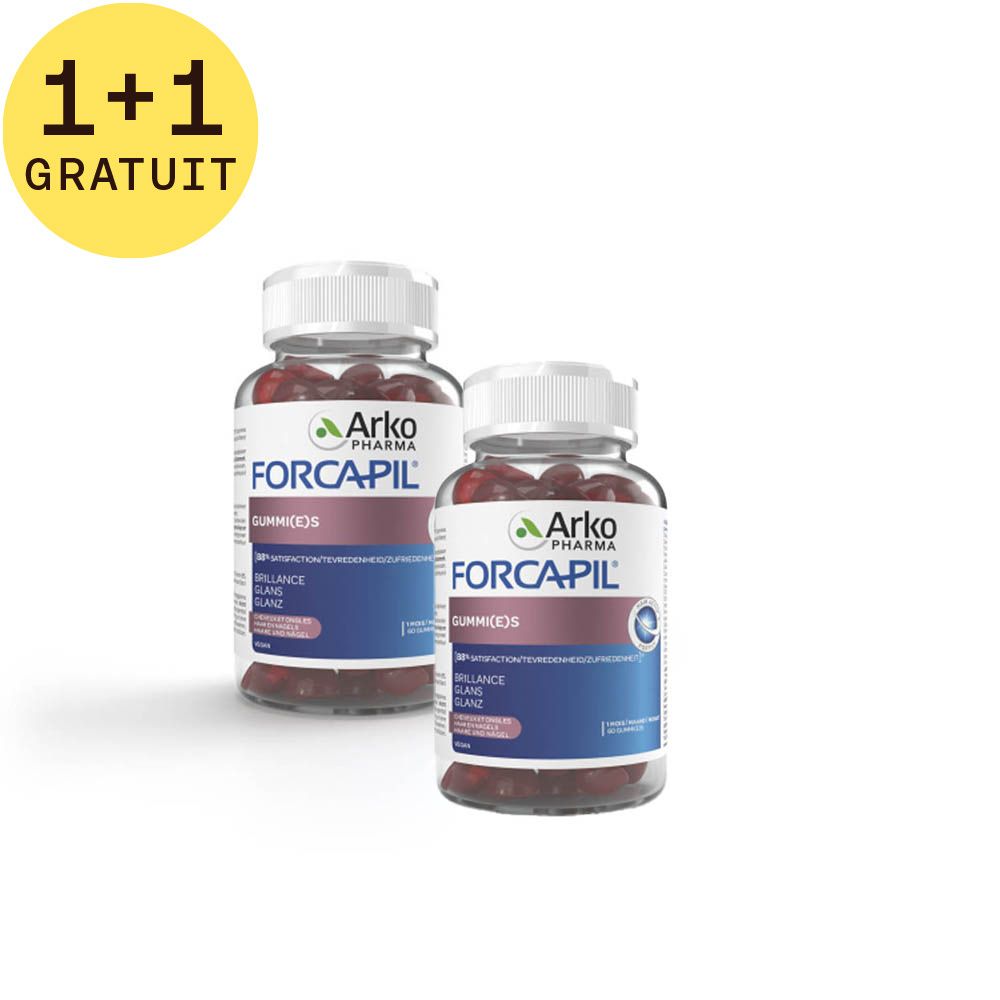 Deux flacons de Forcapil Gummies avec inscription 1+1 GRATUIT. Contient biotine, vitamines, zinc et sélénium.