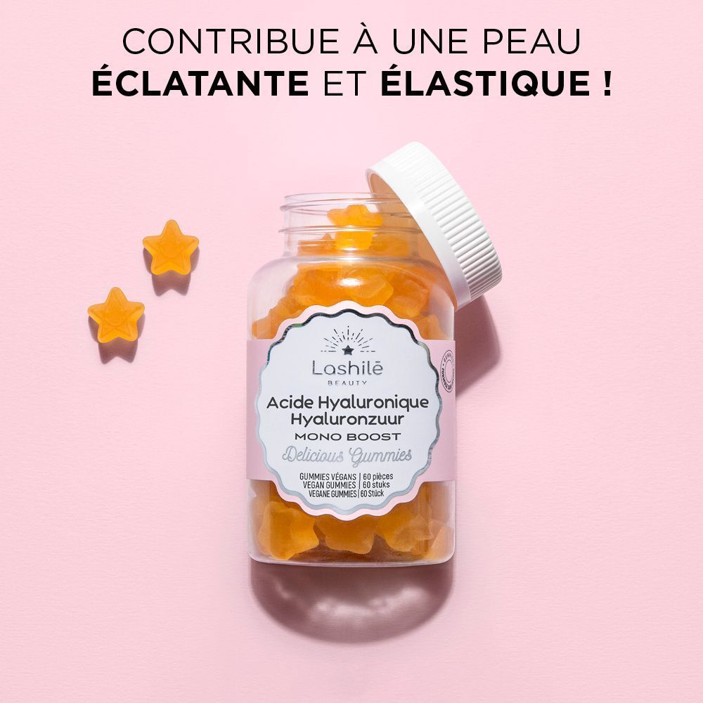 Un flacon de gummies en forme d'étoiles jaunes. Étiquette avec texte. Bouchon blanc.