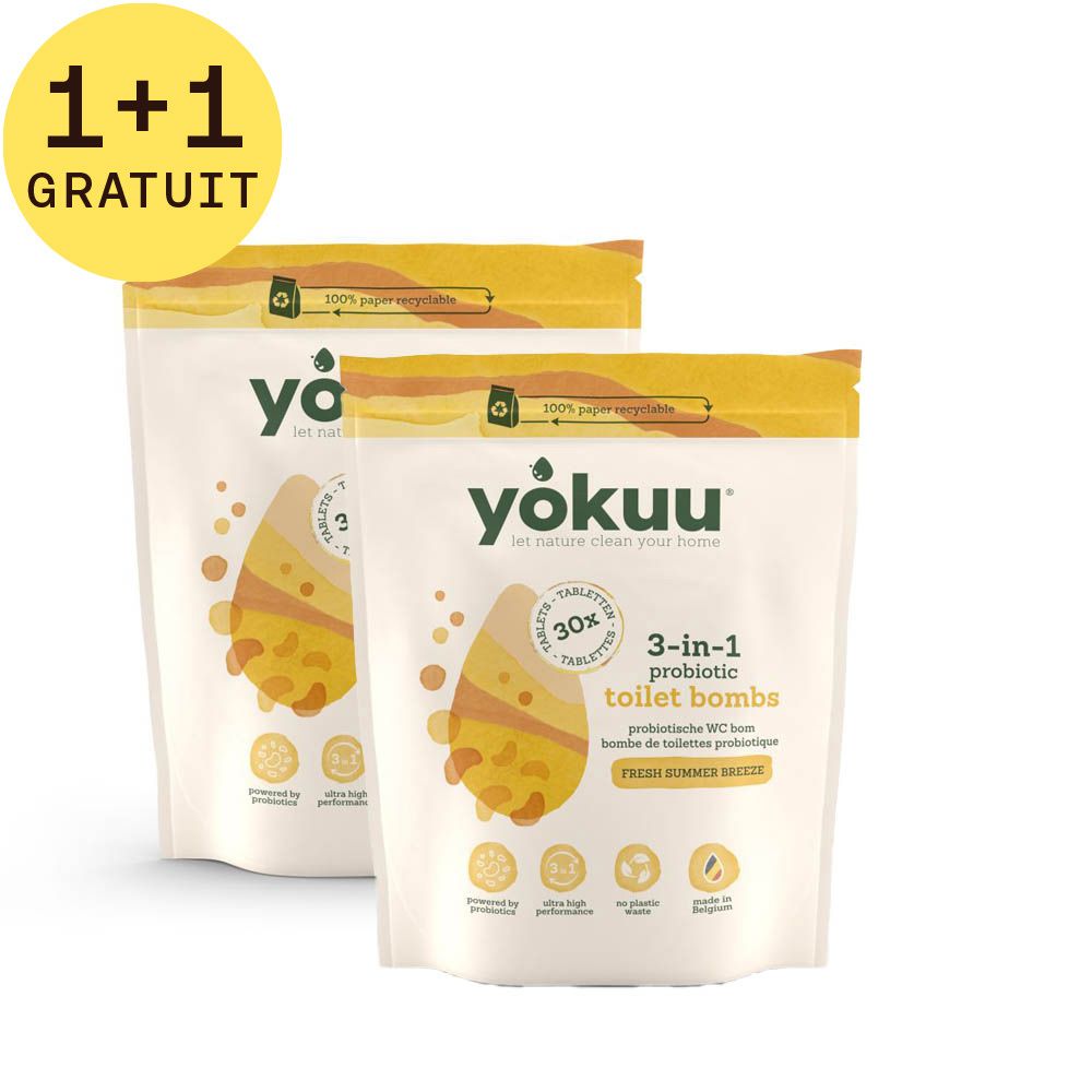 Deux sachets avec fermeture éclair jaune. Inscription : Yokuu, bombes de toilette probiotiques 3-en-1. Design jaune avec informations. 1+1 GRATUIT.