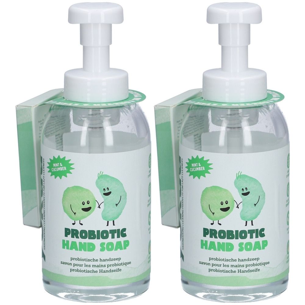 Deux distributeurs de savon transparents avec pompe blanche. Étiquette avec illustrations et texte. Étiquettes vertes. Nom du produit: Probiotic Hand Soap.