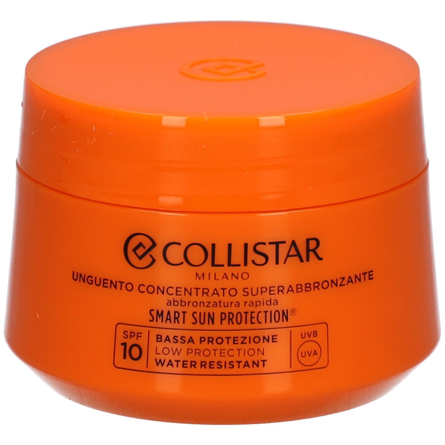 Orangefarbener Tiegel mit Deckel. Aufschrift: Collistar, Unguento Concentrato Superabbronzante, SPF 10.