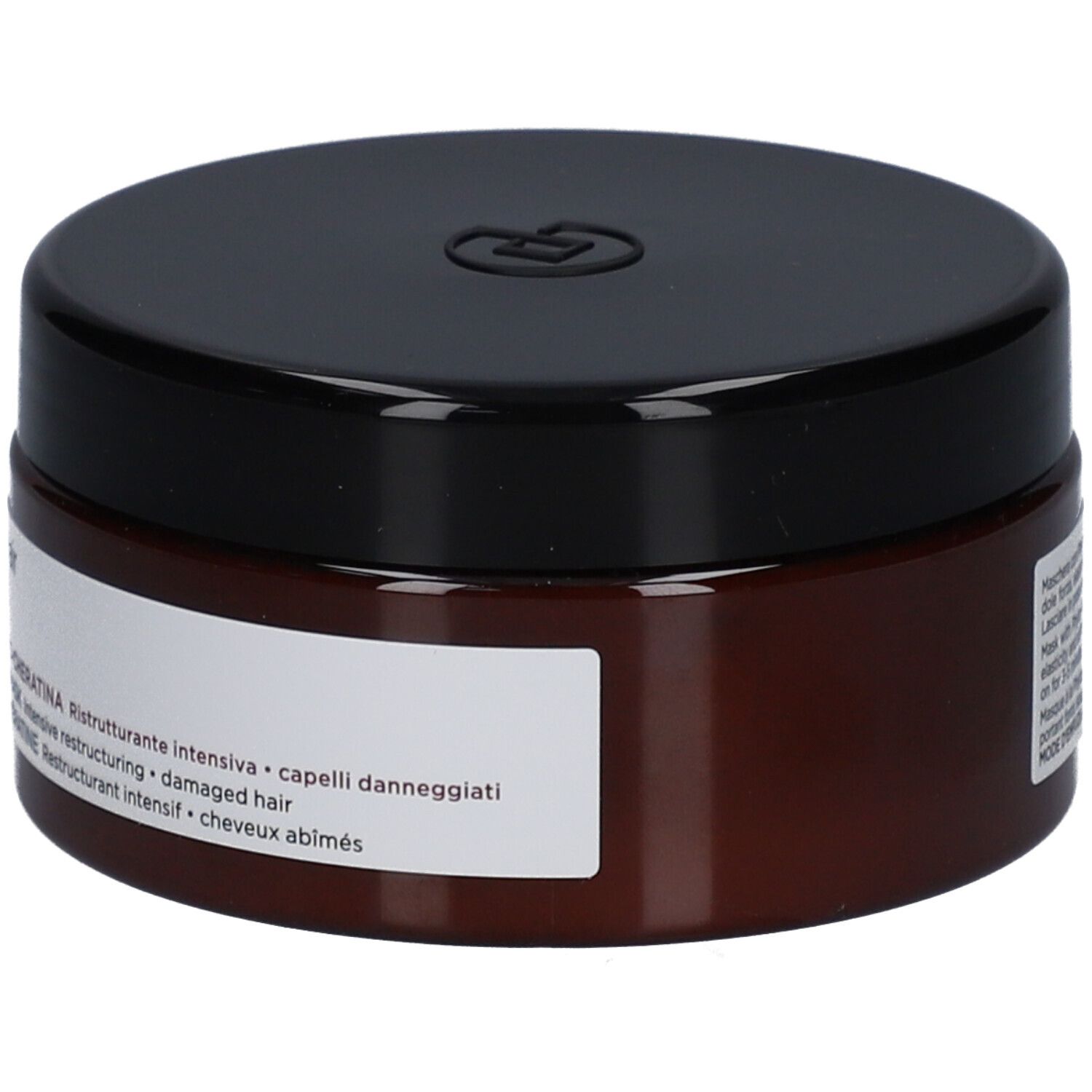 Pot brun avec couvercle noir. Inscription : Maschera Phyto-Cheratina, pour cheveux abîmés.