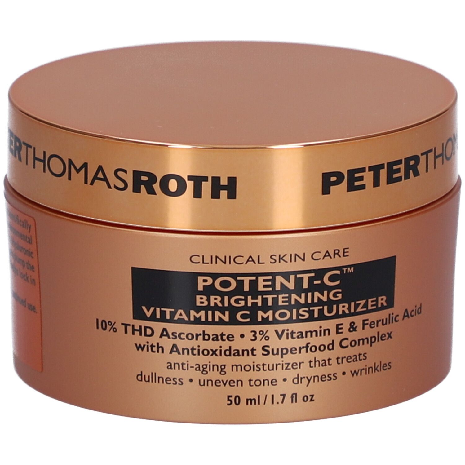Braune Dose mit goldfarbenem Deckel. Aufschrift: POTENT-C, Vitamin C Moisturizer. 50 ml/1.7 fl oz.