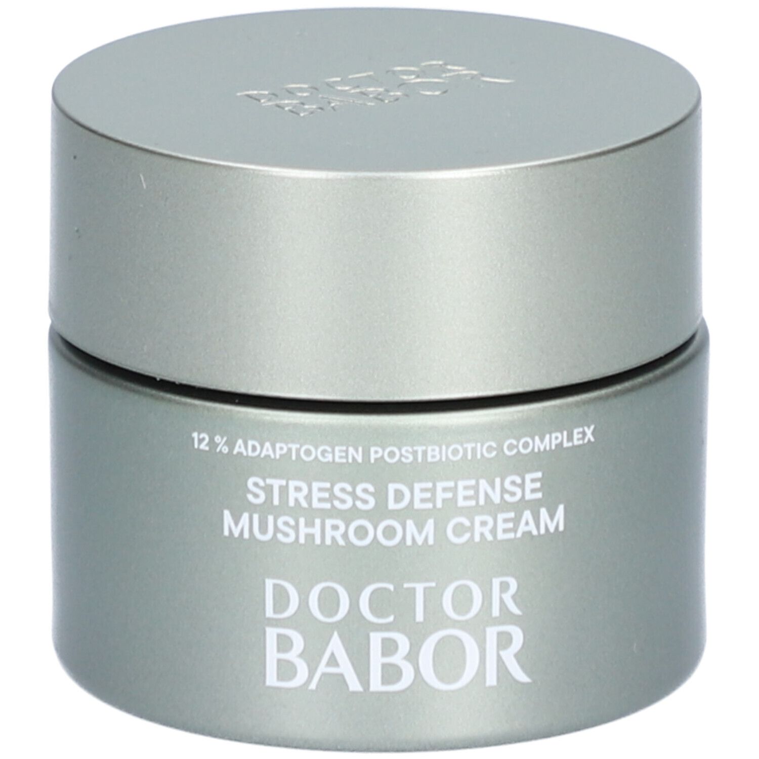 Graue Creme-Dose mit Deckel. Aufschrift: 12% Adaptogen Postbiotic Complex, Stress Defense Mushroom Cream, DOCTOR BABOR.