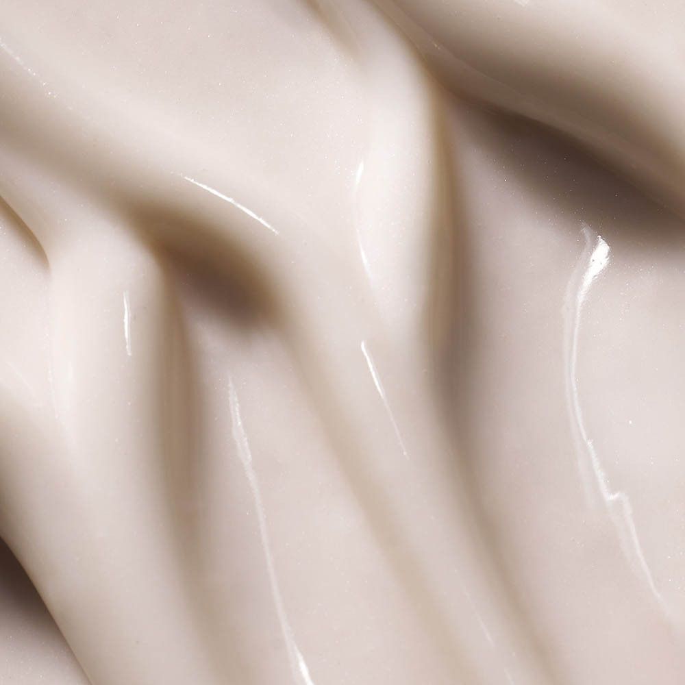 Nahaufnahme von Creme. Cremige Textur, wellenförmig angeordnet.